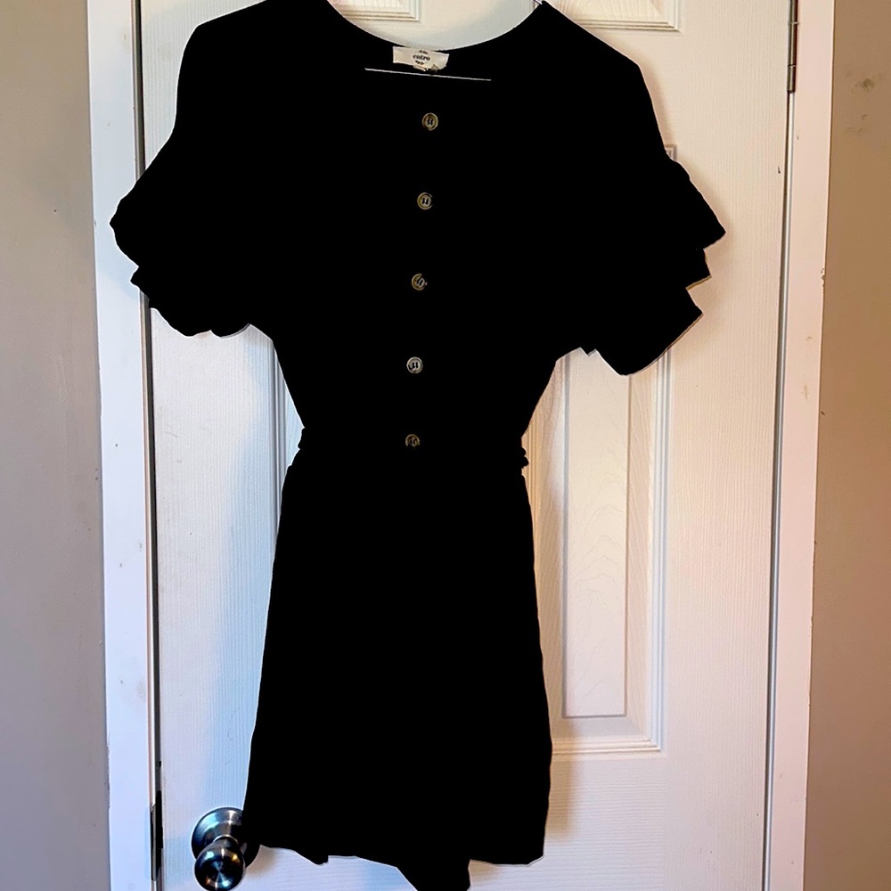 Black romper with tie in front